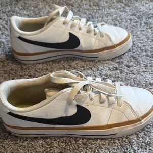 Nike White Sneakers with Black Swoosh and Tan Stripe